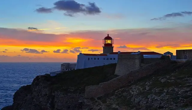 Sunset over the lighthouse and fortress at Cabo de São Vicente